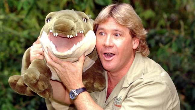 Steve Irwin holding a crocodile