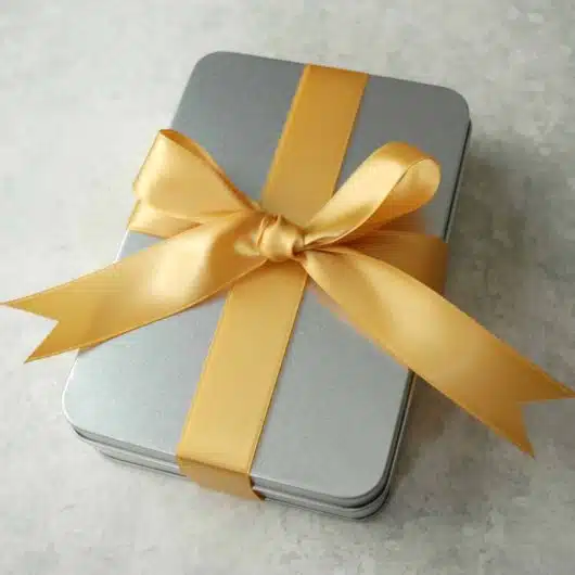 Tin-Box-with-Ribbon-on-Stone